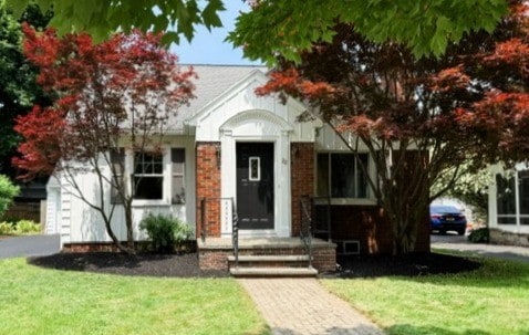 22 Yorkshire Rd, Irondequoit, NY 14609 - view of front of property featuring a front lawn