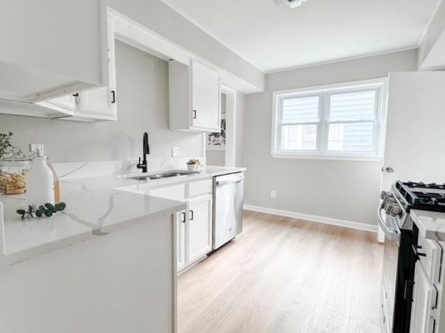 22 Yorkshire Rd, Irondequoit, NY 14609 - kitchen featuring stainless steel appliances, light wood-type flooring, white cabinets, and light stone countertops