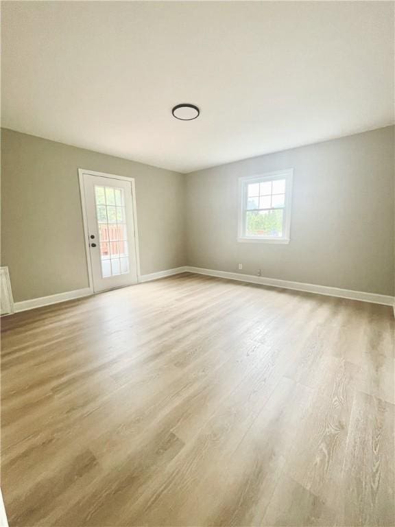 22 Yorkshire Rd, Irondequoit, NY 14609 - unfurnished room with light wood-style floors and baseboards