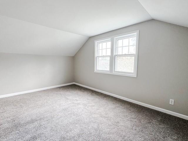 22 Yorkshire Rd, Irondequoit, NY 14609 - additional living space featuring vaulted ceiling and carpet flooring