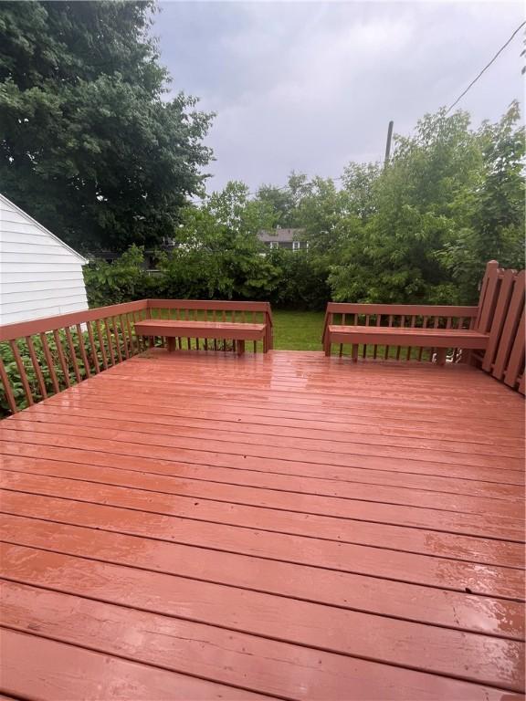 22 Yorkshire Rd, Irondequoit, NY 14609 - wooden terrace with view of wooded area