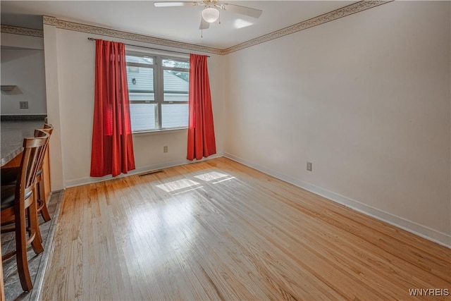 18 Eisenhower Dr, Lockport-City, NY 14094 - spare room featuring ceiling fan and wood finished floors