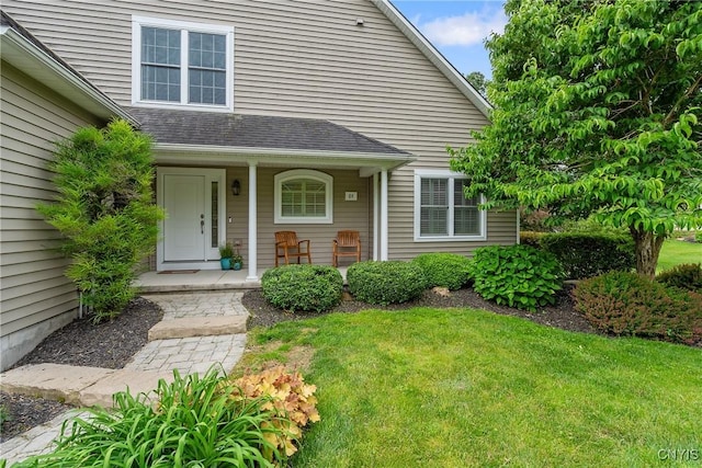 84 Krystyna Ln Unit 6, Cato, NY 13080 - view of front of house with a porch and a front lawn