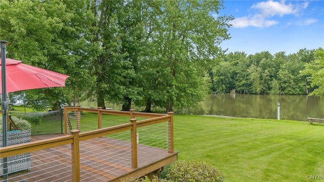 84 Krystyna Ln Unit 6, Cato, NY 13080 - view of green lawn featuring a deck with water view