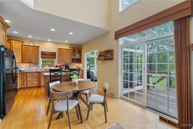 84 Krystyna Ln Unit 6, Cato, NY 13080 - dining space featuring plenty of natural light, light wood-type flooring, and recessed lighting