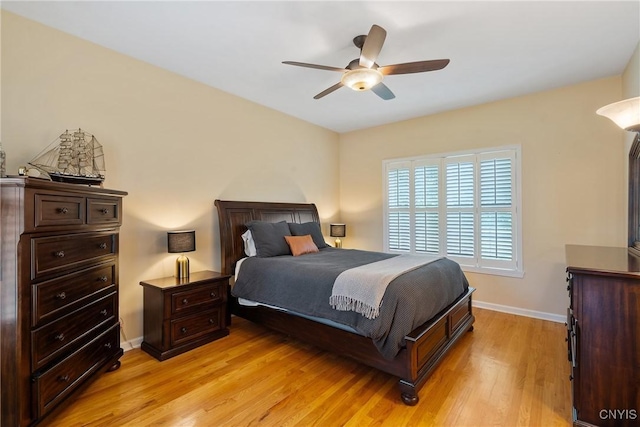 84 Krystyna Ln Unit 6, Cato, NY 13080 - bedroom with light wood-style floors and a ceiling fan