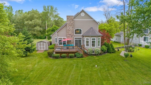 84 Krystyna Ln Unit 6, Cato, NY 13080 - back of property with a storage shed, a wooden deck, and a yard