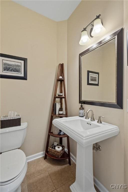 84 Krystyna Ln Unit 6, Cato, NY 13080 - bathroom featuring toilet and tile patterned flooring