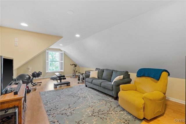 84 Krystyna Ln Unit 6, Cato, NY 13080 - living room with lofted ceiling, wood finished floors, and recessed lighting