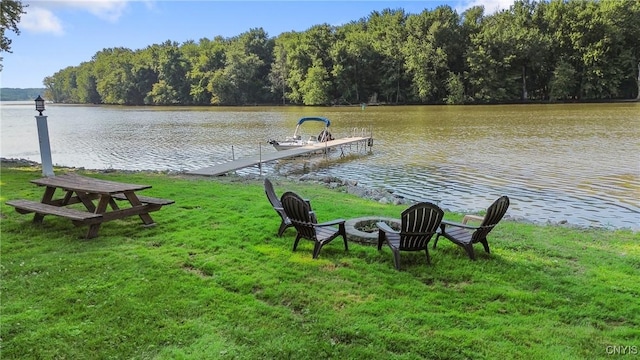 84 Krystyna Ln Unit 6, Cato, NY 13080 - dock featuring a fire pit, a water view, a lawn, and a forest view