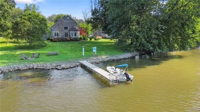 84 Krystyna Ln Unit 6, Cato, NY 13080 - dock featuring a fire pit, a yard, and a water view