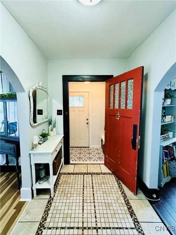 300 Hillsdale Ave, Syracuse, NY 13206 - entrance foyer with arched walkways and light tile patterned floors