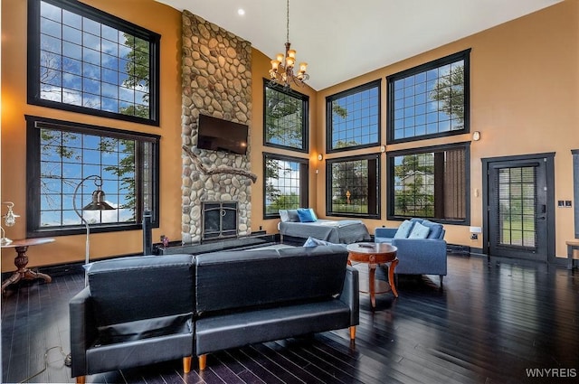 2300 Washington Ave, Wilson, NY 14172 - living area featuring a high ceiling, a chandelier, hardwood / wood-style floors, and healthy amount of natural light