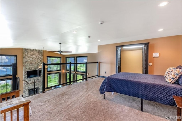 2300 Washington Ave, Wilson, NY 14172 - carpeted bedroom with recessed lighting and a fireplace