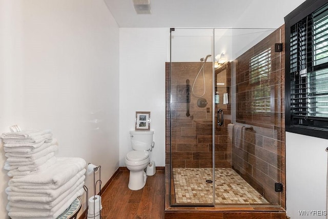 2300 Washington Ave, Wilson, NY 14172 - full bath with wood finished floors, a stall shower, and plenty of natural light