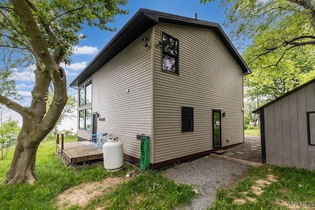 2300 Washington Ave, Wilson, NY 14172 - view of home's exterior with a deck