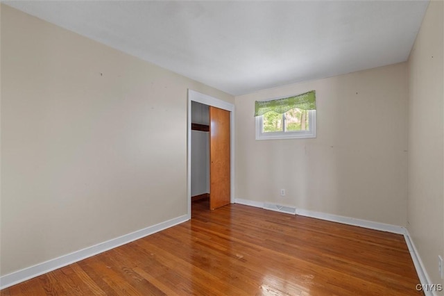 130 Hillcrest Rd, Onondaga, NY 13219 - unfurnished room with baseboards and wood finished floors