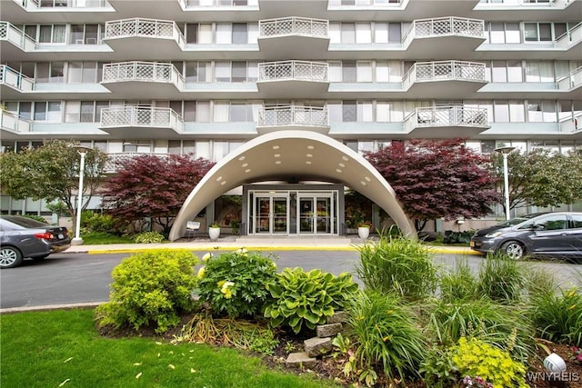 1088 Delaware Ave Unit 3B, Buffalo, NY 14209 - view of apartment building / complex featuring uncovered parking