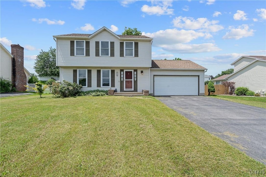 8115 Circuit Rider, Cicero, NY 13039 - colonial house with asphalt driveway and an attached garage