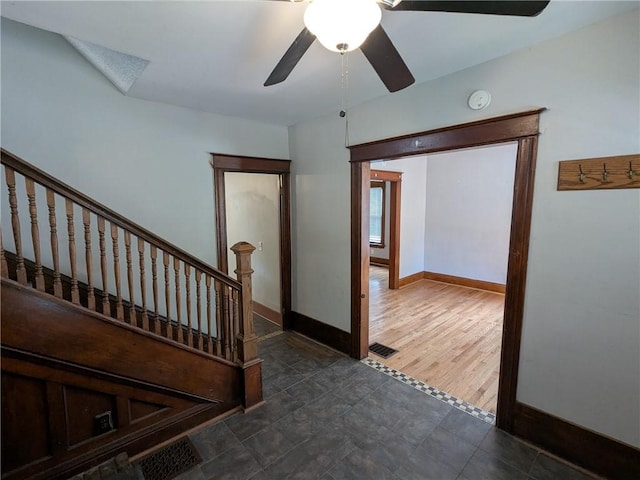 918 S Goodman St, Rochester, NY 14620 - stairs featuring ceiling fan and baseboards