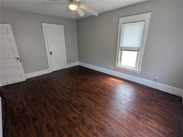 918 S Goodman St, Rochester, NY 14620 - empty room featuring a textured ceiling, dark wood finished floors, and ceiling fan