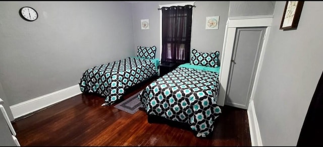 1206 W Water St, Elmira, NY 14905 - bedroom featuring wood finished floors and baseboards