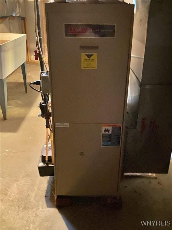 790 Mohawk St, Lewiston, NY 14092 - utility room featuring heating unit