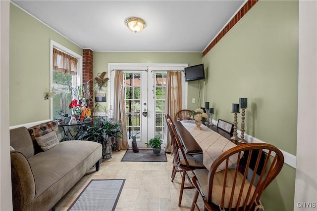 108 Phillips Rd, Syracuse, NY 13214 - sunroom / solarium featuring french doors and healthy amount of natural light