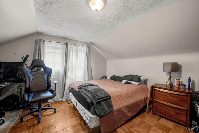 108 Phillips Rd, Syracuse, NY 13214 - bedroom with vaulted ceiling, a textured ceiling, and an office area