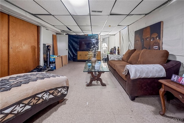 108 Phillips Rd, Syracuse, NY 13214 - living area with a drop ceiling and tile patterned floors