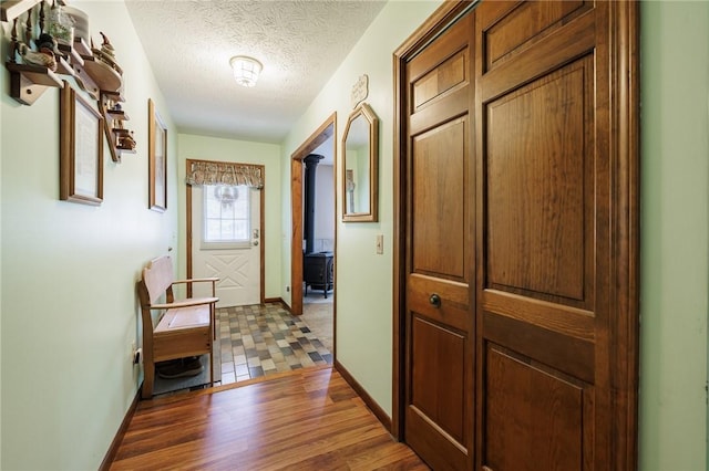 745 Maple Dr, Webster, NY 14580 - hall with a textured ceiling and wood finished floors