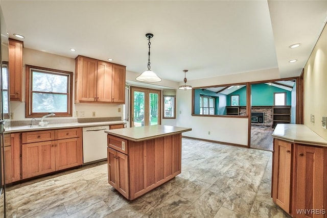 503 Glen Oak Dr, Amherst, NY 14051 - kitchen with white dishwasher, a center island, healthy amount of natural light, hanging light fixtures, and recessed lighting