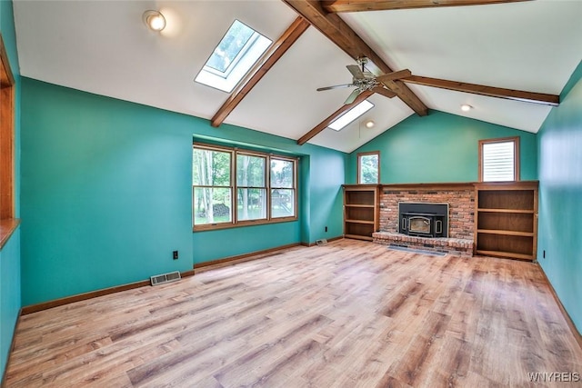 503 Glen Oak Dr, Amherst, NY 14051 - unfurnished living room featuring a skylight, ceiling fan, wood finished floors, and recessed lighting