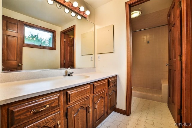 503 Glen Oak Dr, Amherst, NY 14051 - bathroom featuring vanity and a tile shower