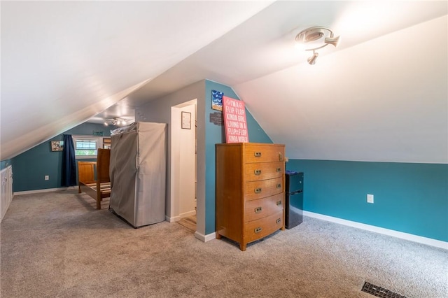 434 Crossfield Rd, Irondequoit, NY 14609 - additional living space with carpet floors and lofted ceiling