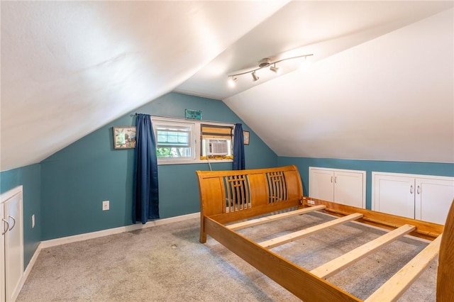 434 Crossfield Rd, Irondequoit, NY 14609 - bedroom featuring light colored carpet, vaulted ceiling, and cooling unit