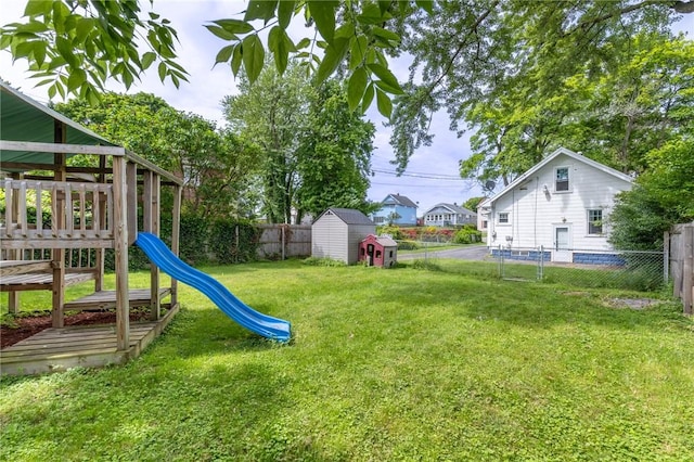 434 Crossfield Rd, Irondequoit, NY 14609 - fenced backyard with a playground and a shed