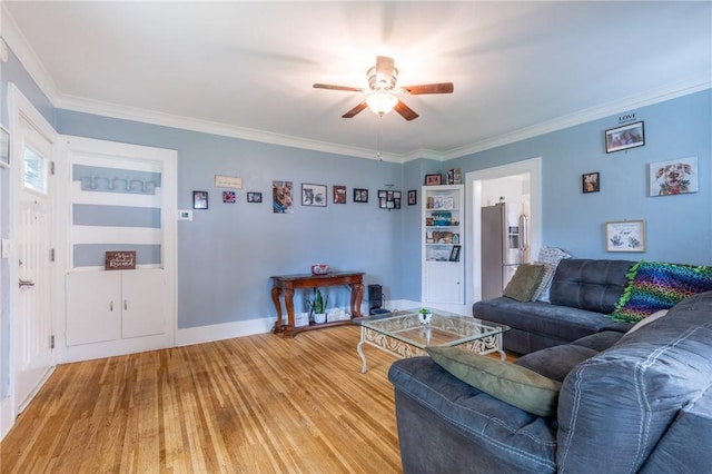 434 Crossfield Rd, Irondequoit, NY 14609 - living area featuring a ceiling fan, wood finished floors, and crown molding