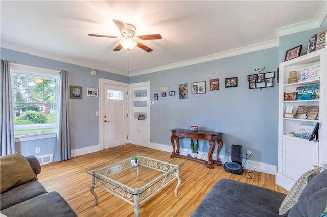 434 Crossfield Rd, Irondequoit, NY 14609 - living room featuring ceiling fan, wood finished floors, and ornamental molding