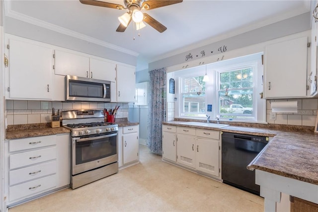434 Crossfield Rd, Irondequoit, NY 14609 - kitchen featuring appliances with stainless steel finishes, white cabinets, light flooring, ceiling fan, and backsplash