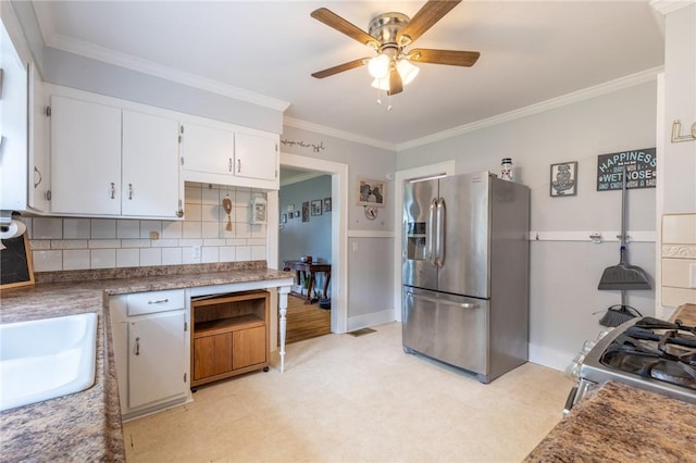 434 Crossfield Rd, Irondequoit, NY 14609 - kitchen featuring appliances with stainless steel finishes, ceiling fan, light flooring, ornamental molding, and white cabinetry