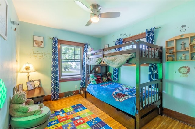 434 Crossfield Rd, Irondequoit, NY 14609 - bedroom with wood finished floors and a ceiling fan