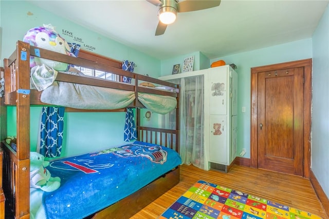 434 Crossfield Rd, Irondequoit, NY 14609 - bedroom featuring wood finished floors and a ceiling fan