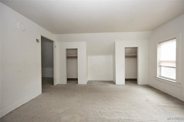 34 Schiller St, Buffalo, NY 14206 - unfurnished bedroom featuring multiple closets and carpet floors