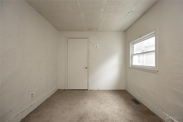 34 Schiller St, Buffalo, NY 14206 - carpeted spare room with a paneled ceiling