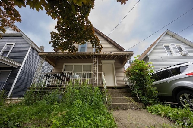 34 Schiller St, Buffalo, NY 14206 - view of front of house with a porch