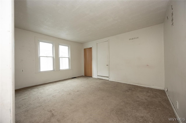34 Schiller St, Buffalo, NY 14206 - unfurnished room with light colored carpet and baseboards