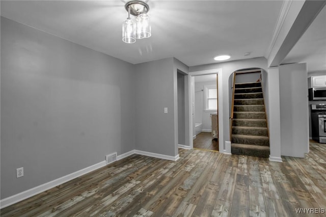 25 Cresthaven Dr, Cheektowaga, NY 14225 - unfurnished room featuring wood finished floors and stairway