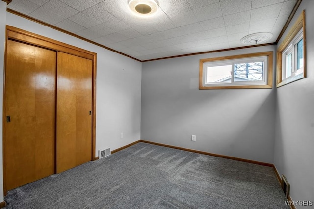 25 Cresthaven Dr, Cheektowaga, NY 14225 - unfurnished bedroom featuring ornamental molding, carpet, and a closet