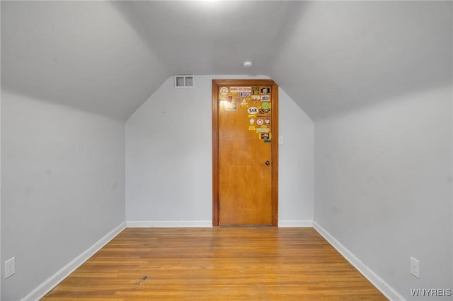 25 Cresthaven Dr, Cheektowaga, NY 14225 - additional living space featuring vaulted ceiling and light wood-style floors